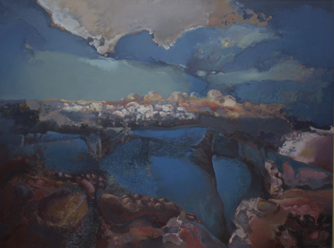 A blue nocturne with a crest of lit white stones at the centre and red-brown banks in the foreground.